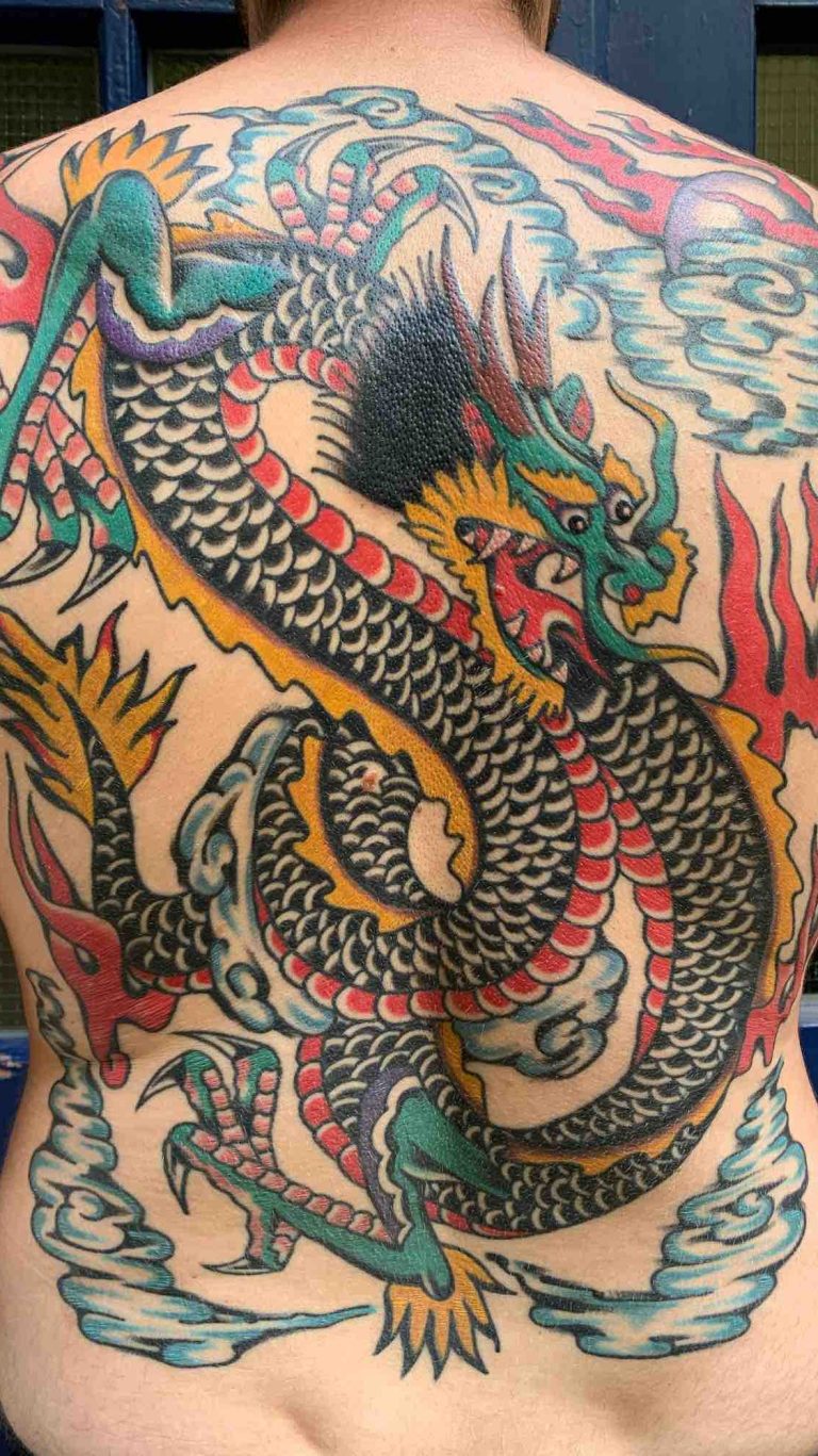 Traditional tattoo Berlin - Tattoos by Mariano - A traditional tattoo of a dragon as a back piece