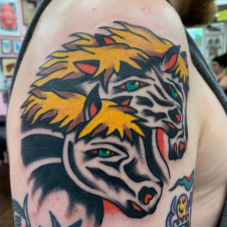 Traditional tattoo Berlin – Tattoos by Mariano – Pharaoh's horses classic tattoo design featuring two stylized horse heads.