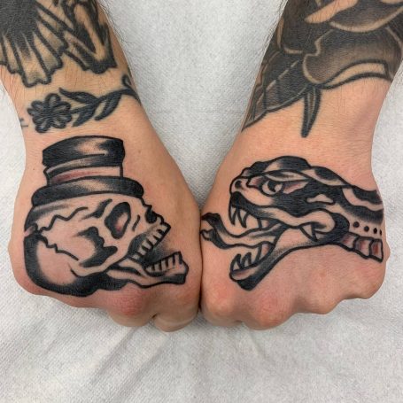 Traditional Tattoo Berlin - Tattoos by Mariano - traditional tattoos of skull with a top hat and snake on a hand