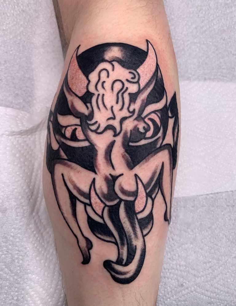 Traditional Tattoo Berlin - Tattoos by Mariano - An artistic tattoo of a female figure with horns and an devil-like face.